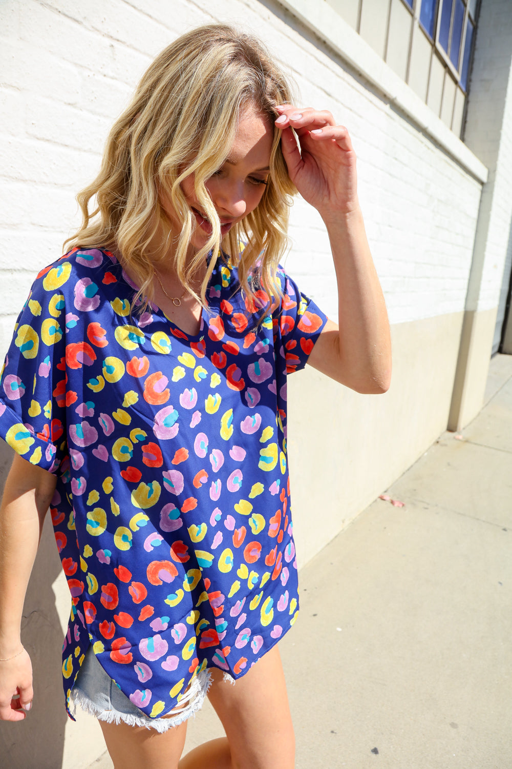 Follow Me Navy Blue Animal Print V Neck Dolman Hi-Lo Blouse